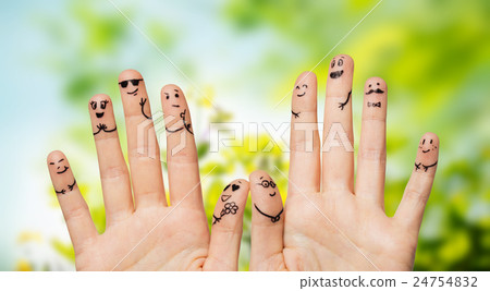 close up of hands and fingers with smiley faces close up of hands and fingers with smiley faces 24754832