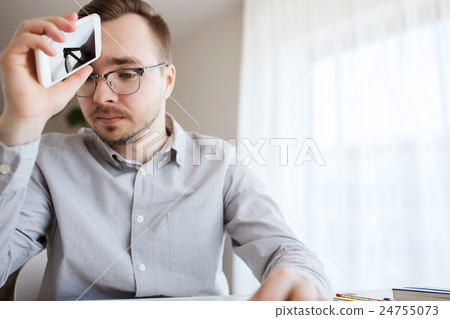 businessman with smarphone at home office businessman with smarphone at home office 24755073