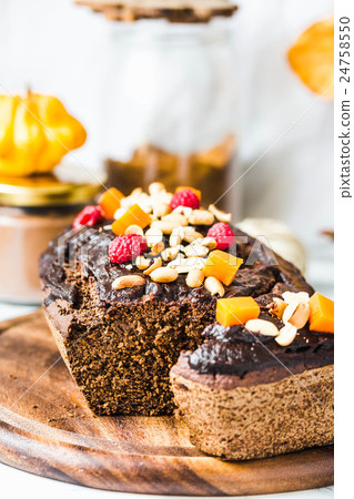 chocolate cake with pumpkin, nuts , autumn baked chocolate cake with pumpkin, nuts , autumn baked 24758550