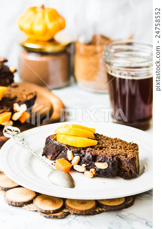 chocolate cake with pumpkin, nuts , autumn baked chocolate cake with pumpkin, nuts , autumn baked 24758552