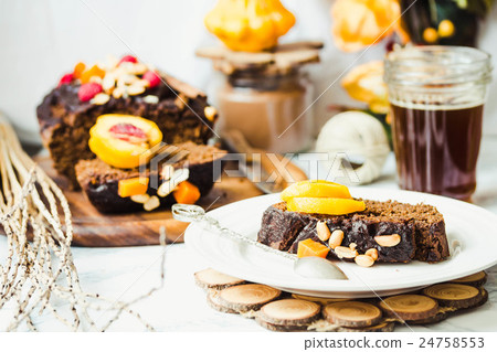 chocolate cake with pumpkin, nuts , autumn baked chocolate cake with pumpkin, nuts , autumn baked 24758553