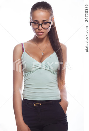 Young beautiful brunette woman posing wearing Young beautiful brunette woman posing wearing 24758586