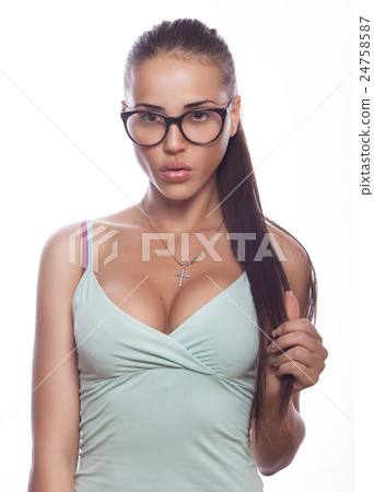 Young beautiful brunette woman posing wearing 24758587