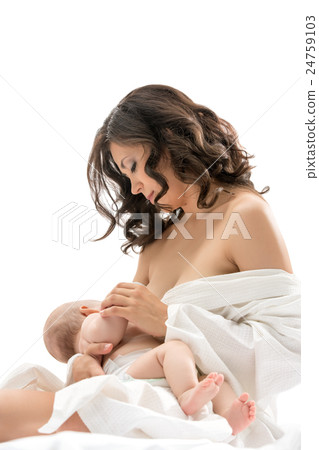 Maternity. Thoughtful mother feeding her child Maternity. Thoughtful mother feeding her child 24759103