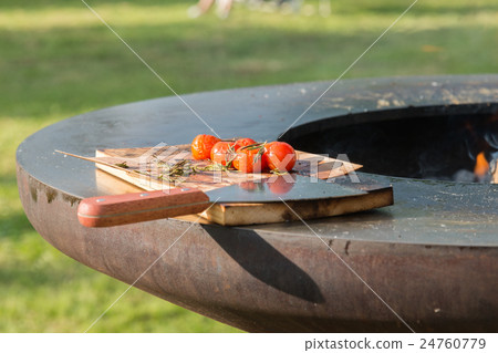tomatoes on the grill pan the table tomatoes on the grill pan the table 24760779
