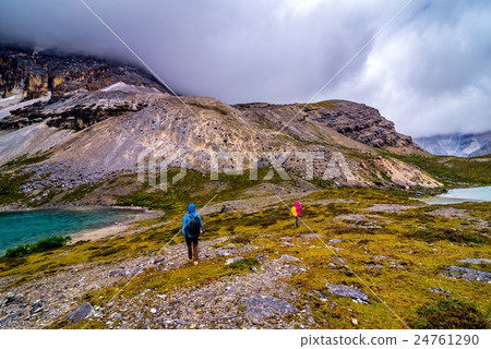 traveler with snow mountain and lake traveler with snow mountain and lake 24761290