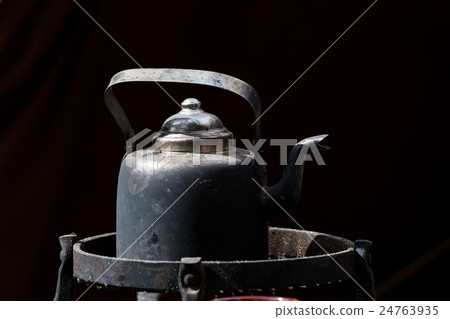 Old black coffee pot 24763935
