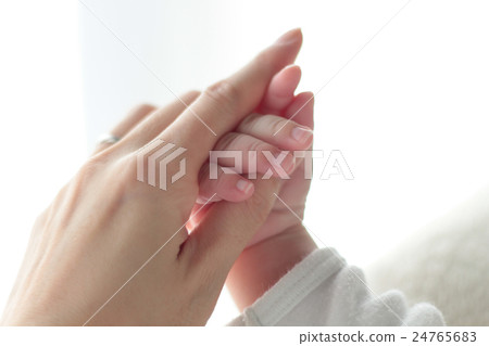 Mother and baby hands Mother and baby hands 24765683