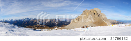 The panorama of ski slope and skiers  24766182