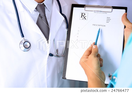 medical doctor showing prescription. Teamwork medical doctor showing prescription. Teamwork 24766477