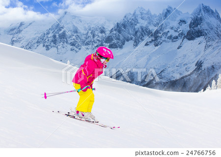 Little girl skiing in the mountains Little girl skiing in the mountains 24766756