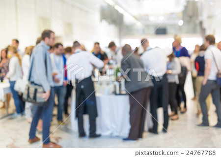Abstract blurred people socializing during coffee Abstract blurred people socializing during coffee 24767788
