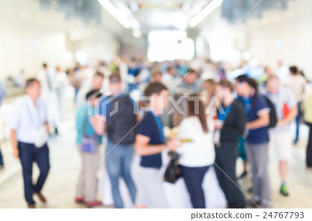 Abstract blurred people socializing during lunch Abstract blurred people socializing during lunch 24767793