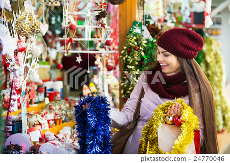 Girl shopping at festive fair 24770046