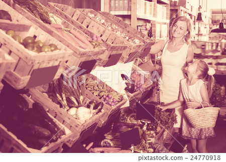 Portrait of glad adult woman and girl shopping Portrait of glad adult woman and girl shopping 24770918