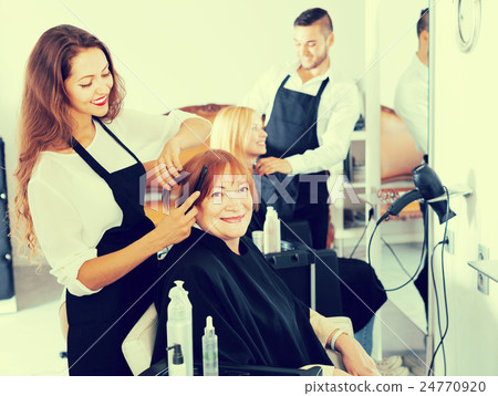 Barber makes the cut for woman Barber makes the cut for woman 24770920