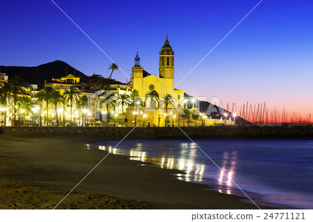 Sunset view of church at beach. Sitges 24771121
