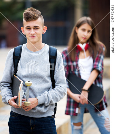 Teenage friends making things up after quarrel 24771482