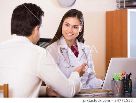 doctor receiving ill patient doctor receiving ill patient 24771553