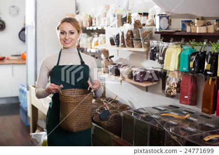 Female seller in organic shop 24771699