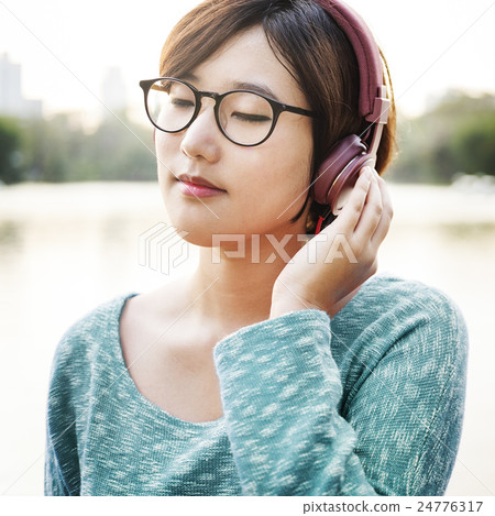 Woman Listening Music Media Entertainment Relaxation Concept Woman Listening Music Media Entertainment Relaxation Concept 24776317