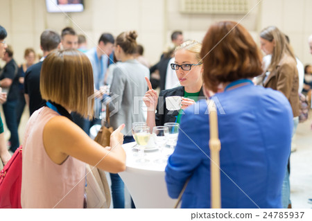 People interacting during coffee break at medical 24785937