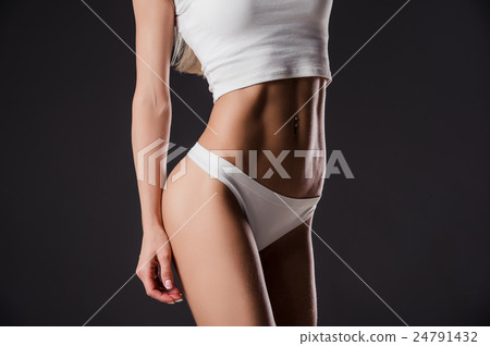 close up picture of woman trained abs 24791432