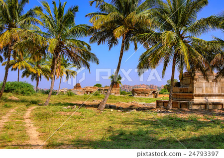 Tourist indian landmark Ancient ruins in Hampi Tourist indian landmark Ancient ruins in Hampi 24793397