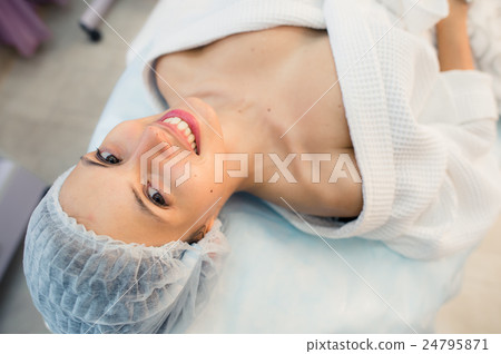 beautiful patient woman smile lying on bed in beautiful patient woman smile lying on bed in 24795871