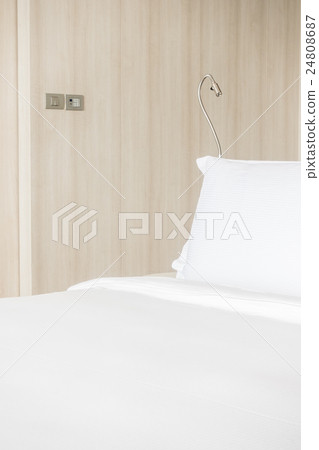 White pillow on bed White pillow on bed 24808687