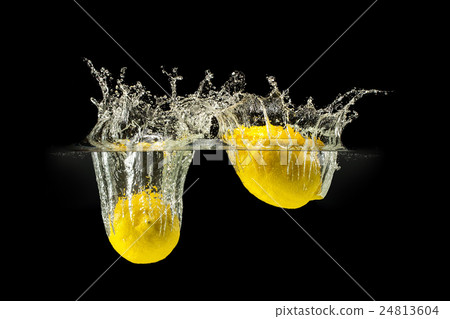 Group of fresh fruits falling in water on black Group of fresh fruits falling in water on black 24813604