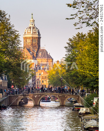 Saint Nicholas church with canal in Amsterdam 24817661