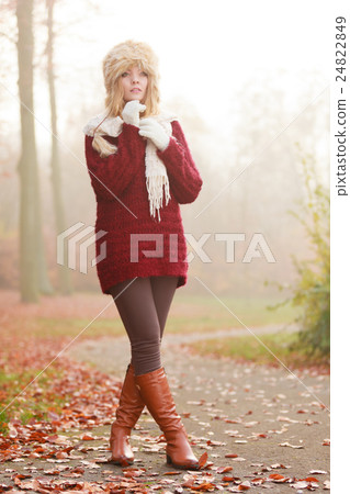 Pretty fashion woman in fur winter hat. Pretty fashion woman in fur winter hat. 24822849