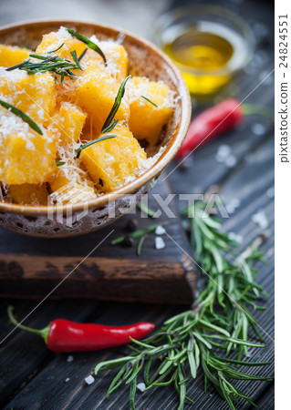 Crunchy croutons in bowl with rosemary Crunchy croutons in bowl with rosemary 24824551
