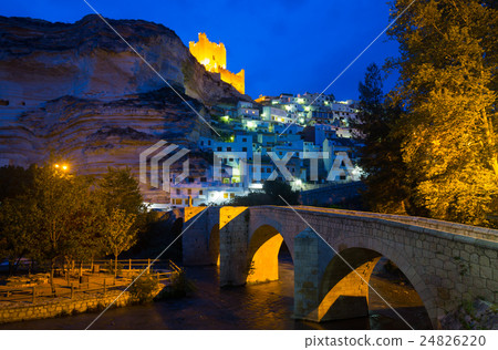 night view of Alcala del Jucar with castle and bridge 24826220