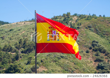 Flag of Spain with mountains at the distance Flag of Spain with mountains at the distance 24826368