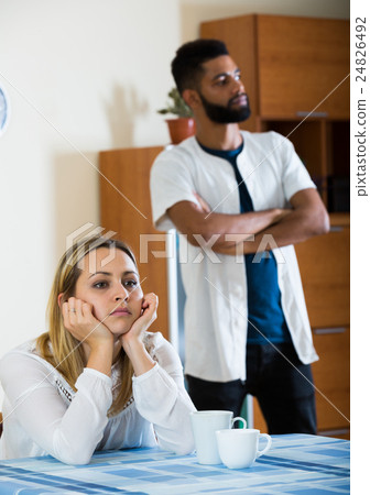 Offended black guy having bad fight with girlfriend and shouting 24826492