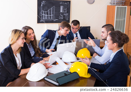 Team of architects at office. 24826636