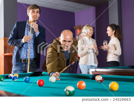 people having pool game 24826663
