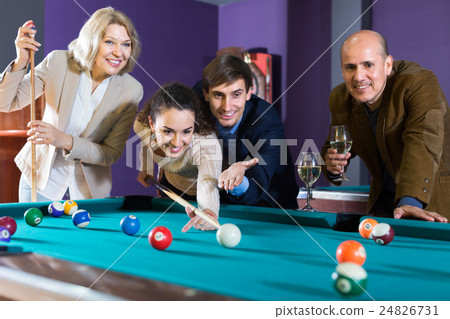 People playing billiard 24826731