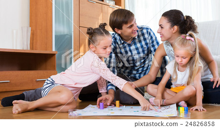 Family playing at board game 24826858