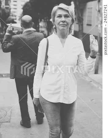 irritated woman outdoors 24827241