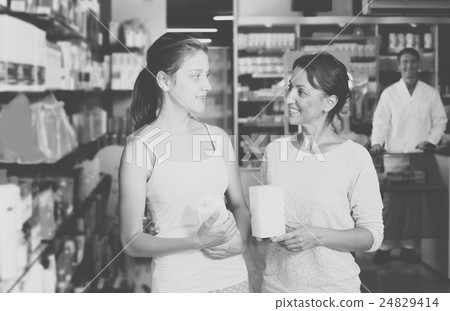 Portrait of glad woman with daughter teenager Portrait of glad woman with daughter teenager 24829414