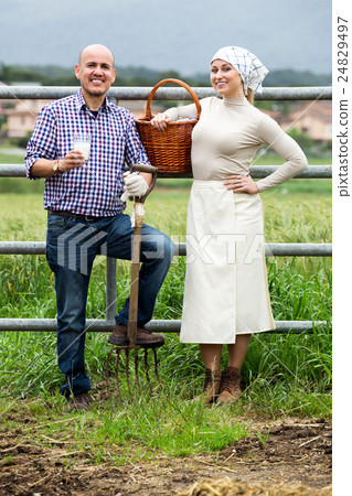 Man and woman chatting and enjoying milk Man and woman chatting and enjoying milk 24829497