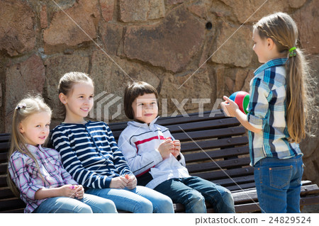 Kids with small ball playing 24829524