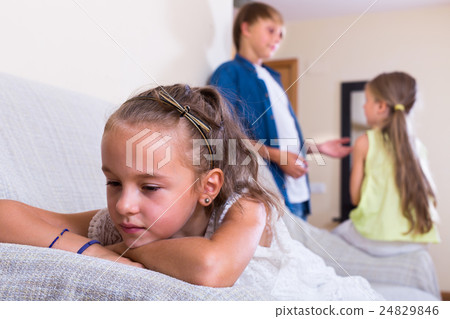 child sitting aside of boy and girl 24829846