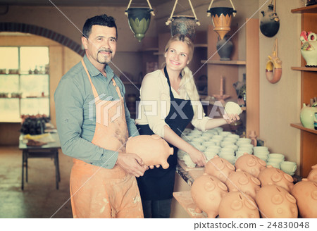 Two craftsmen with ceramic 24830048