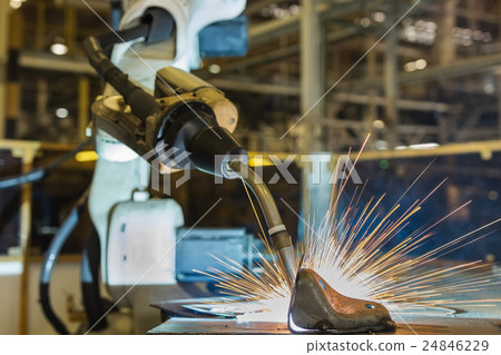Robot welding in automotive factory 24846229