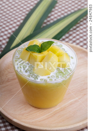 Thai dessert of tapioca pearls pudding with mango 24847983