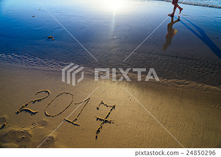 New Year 2017 number on sand 24850296